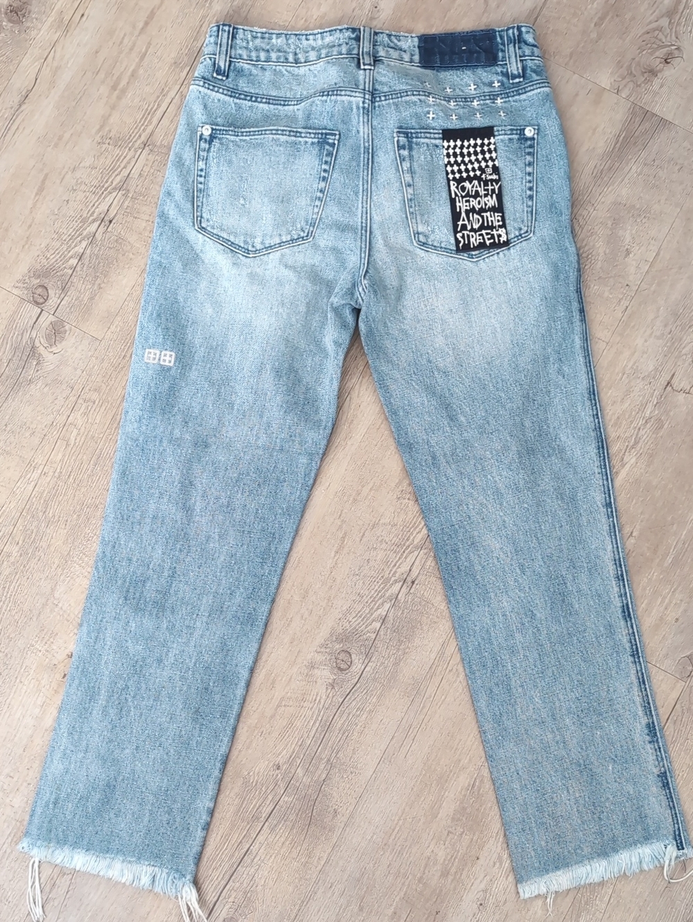 Heroism Light Blue Denim Jeans with Graphic Back Pocket
